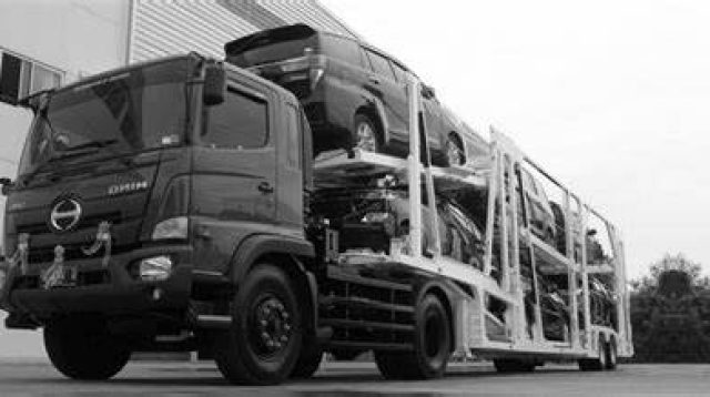 Ilustrasi jasa pengiriman mobil. (Ist)